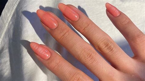 understated pink coral nails